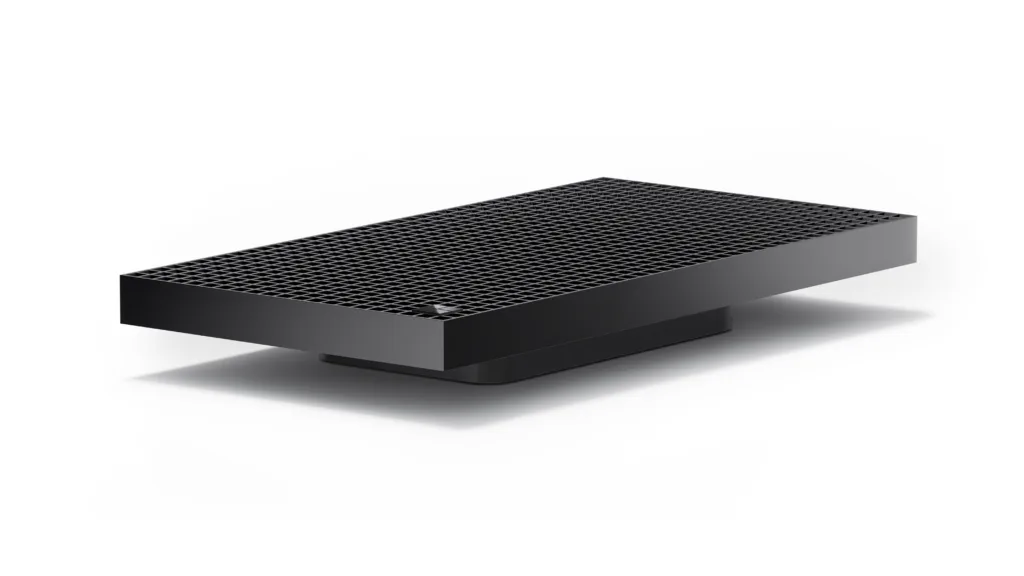 Surface RTX Spark Dev Box เครื่องตั้งโต๊ะขนาดเล็กสีดำ ฝาด้านบนเป็นตะแกรงระบายอากาศ